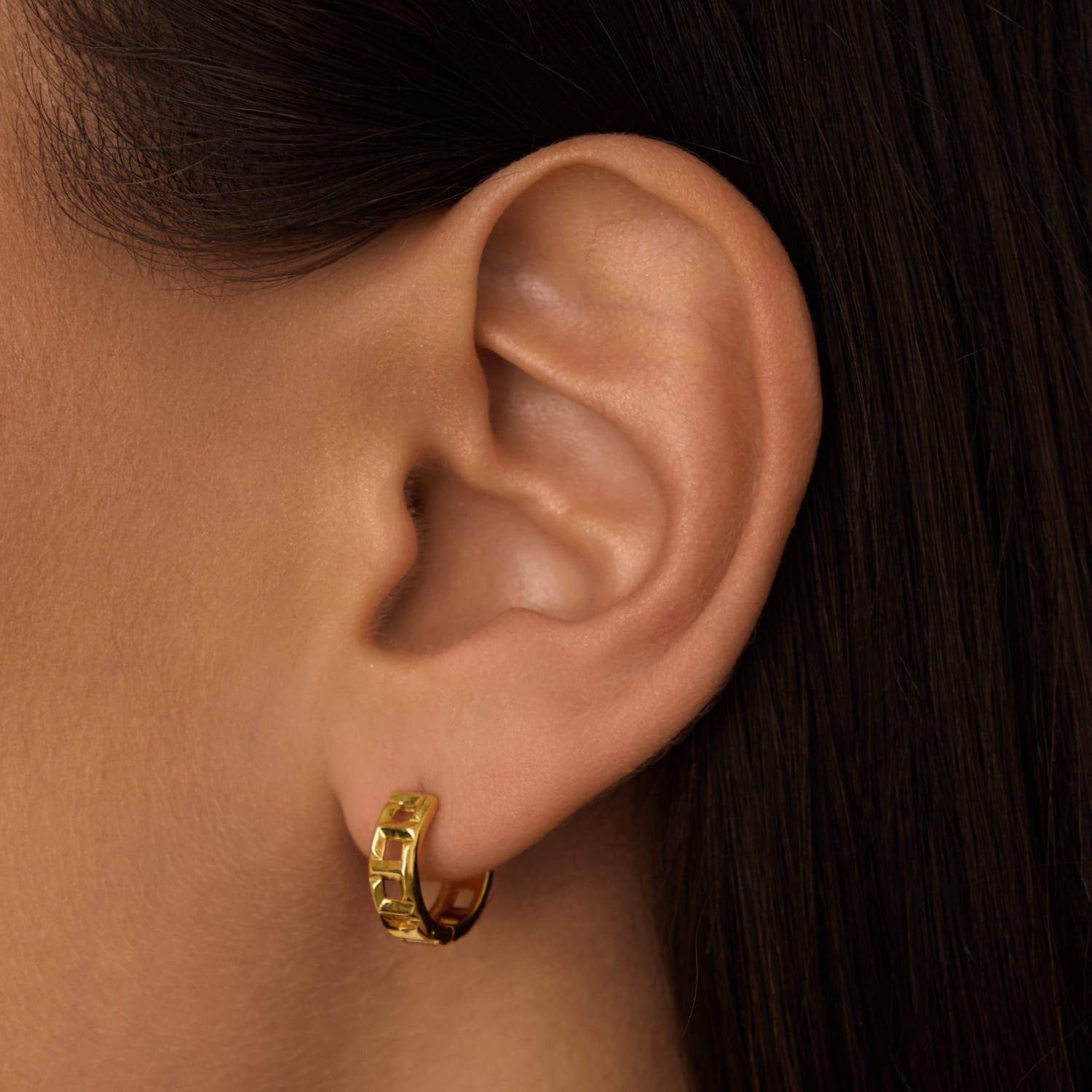 

Рельефные серебряные серьги-кольца в позолоте MIESTILO MIE