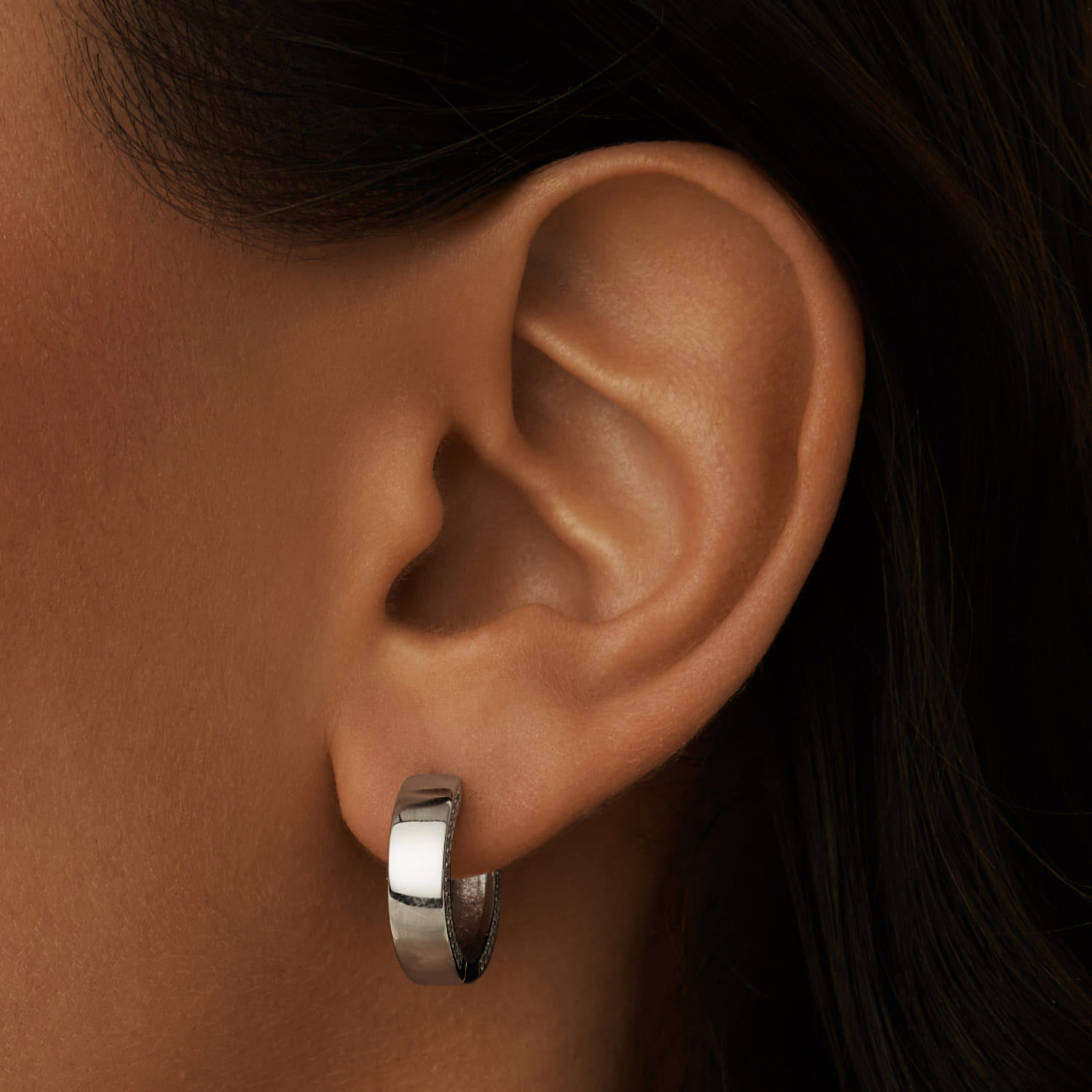 Серебряные двусторонние серьги-кольца с фианитами MIE