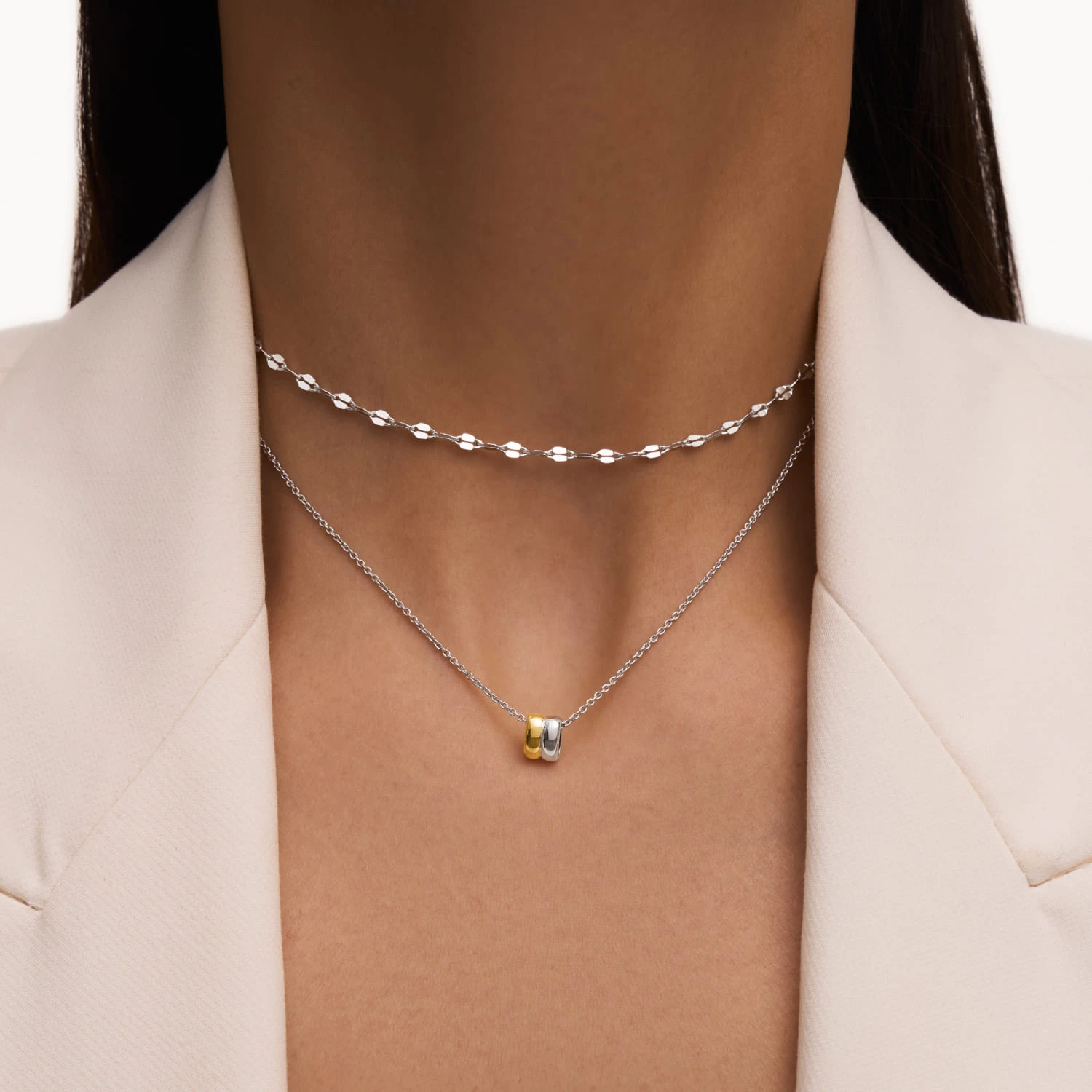 Серебряное колье с подвеской биколор