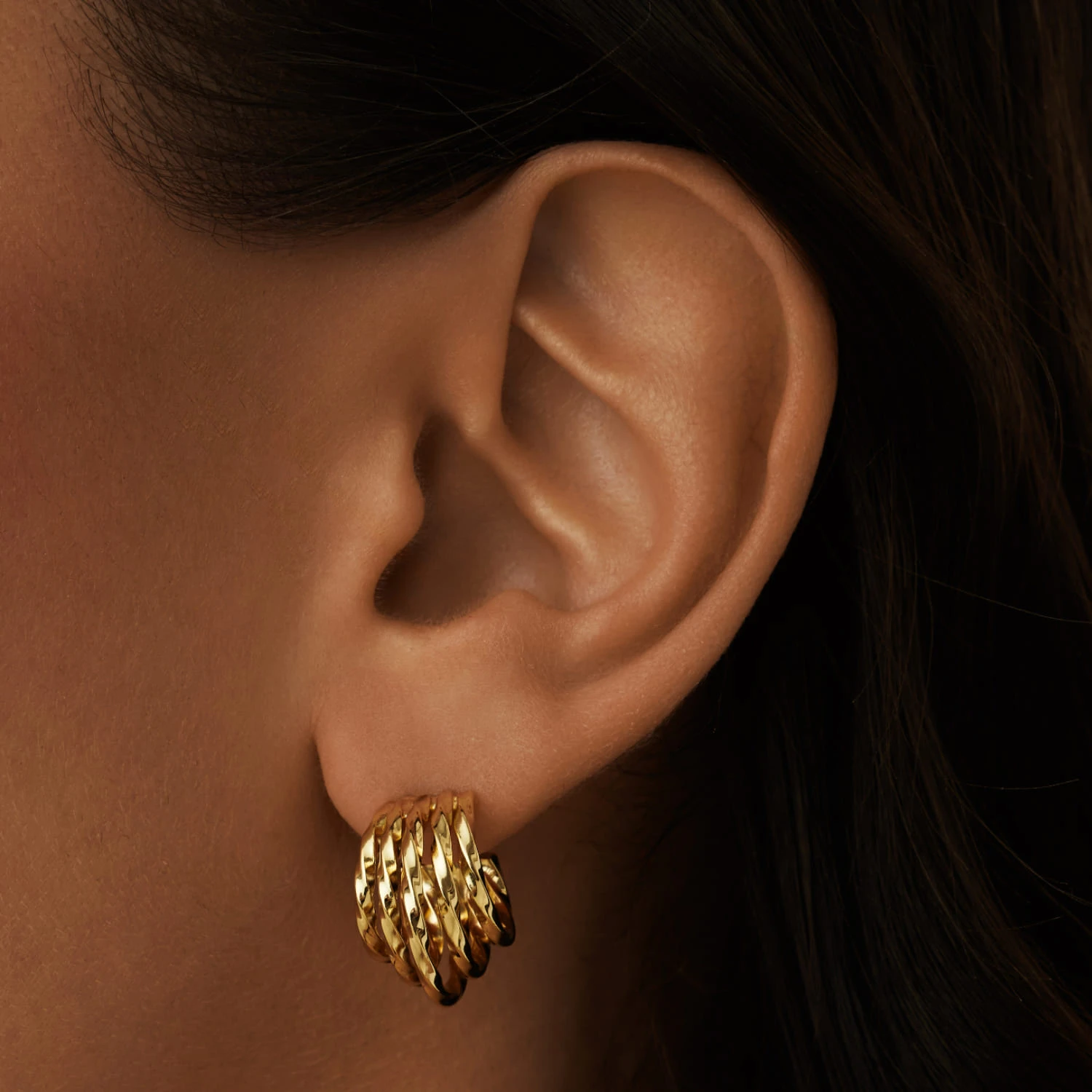 Многослойные витые серьги из серебра в покрытии желтое золото