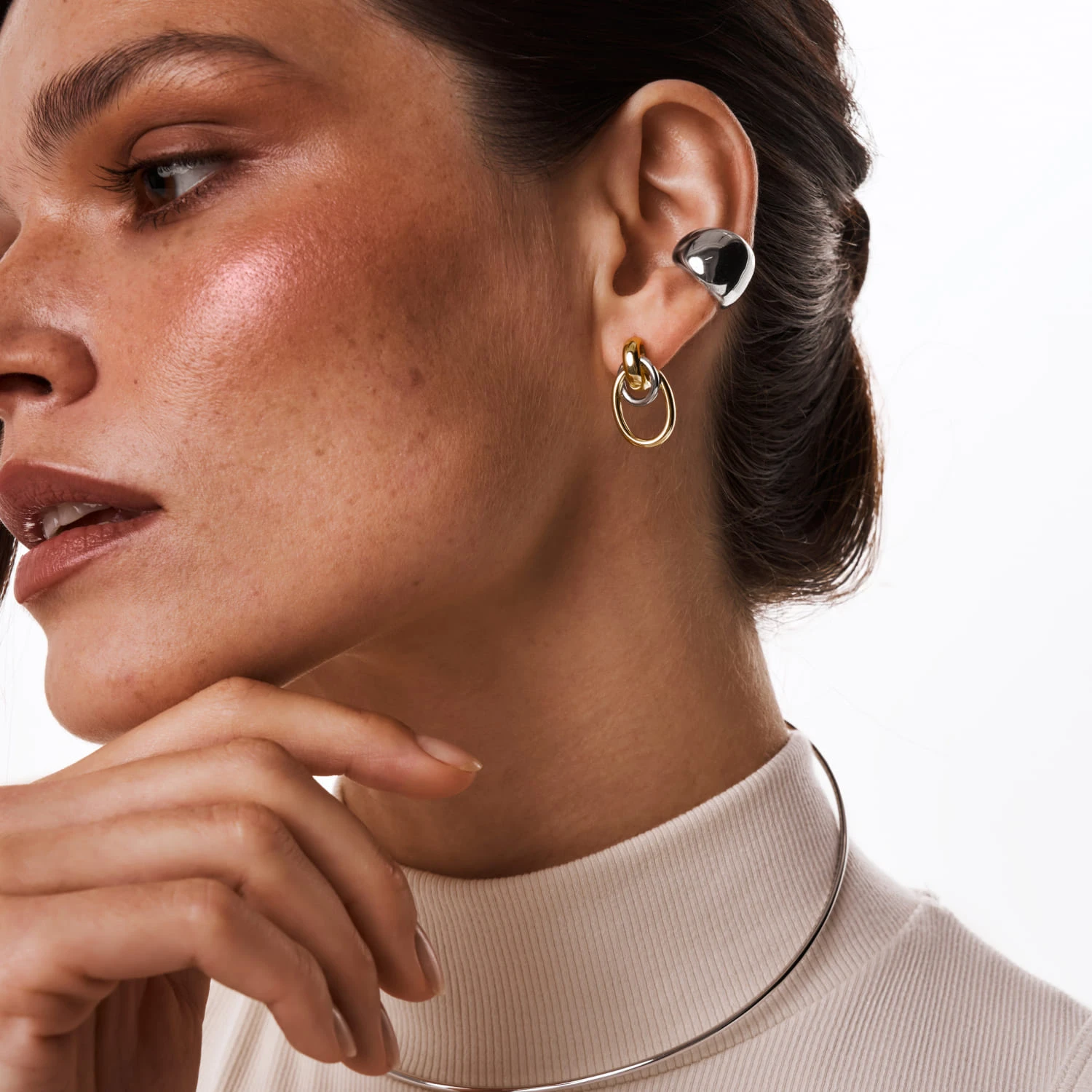 Серебряные крупные серьги-узлы в покрытии биколор