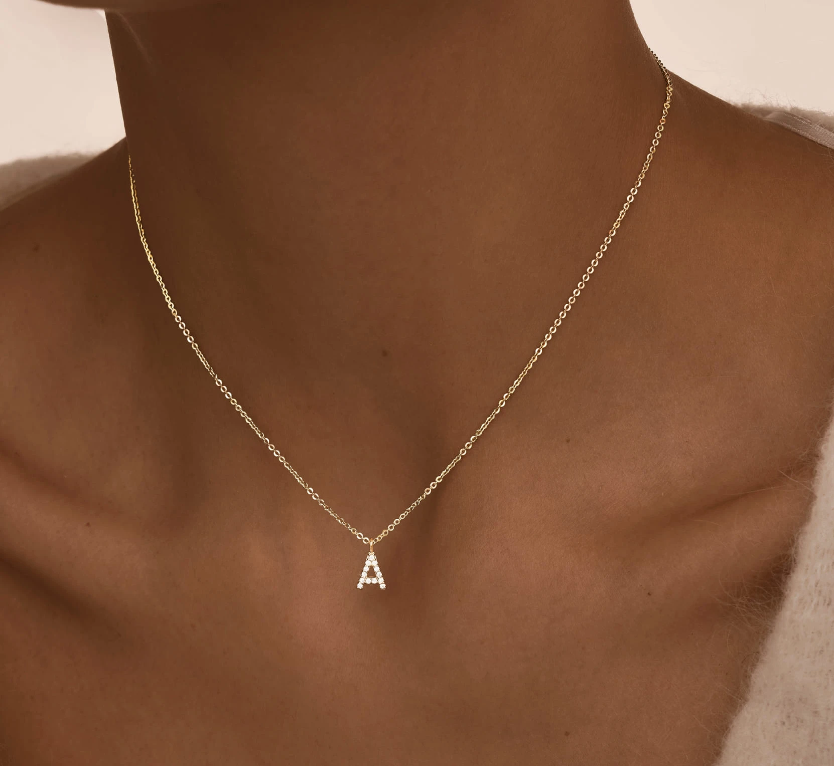 Серебряное колье  в покрытии желтое золото  с буквой А MIESTILO