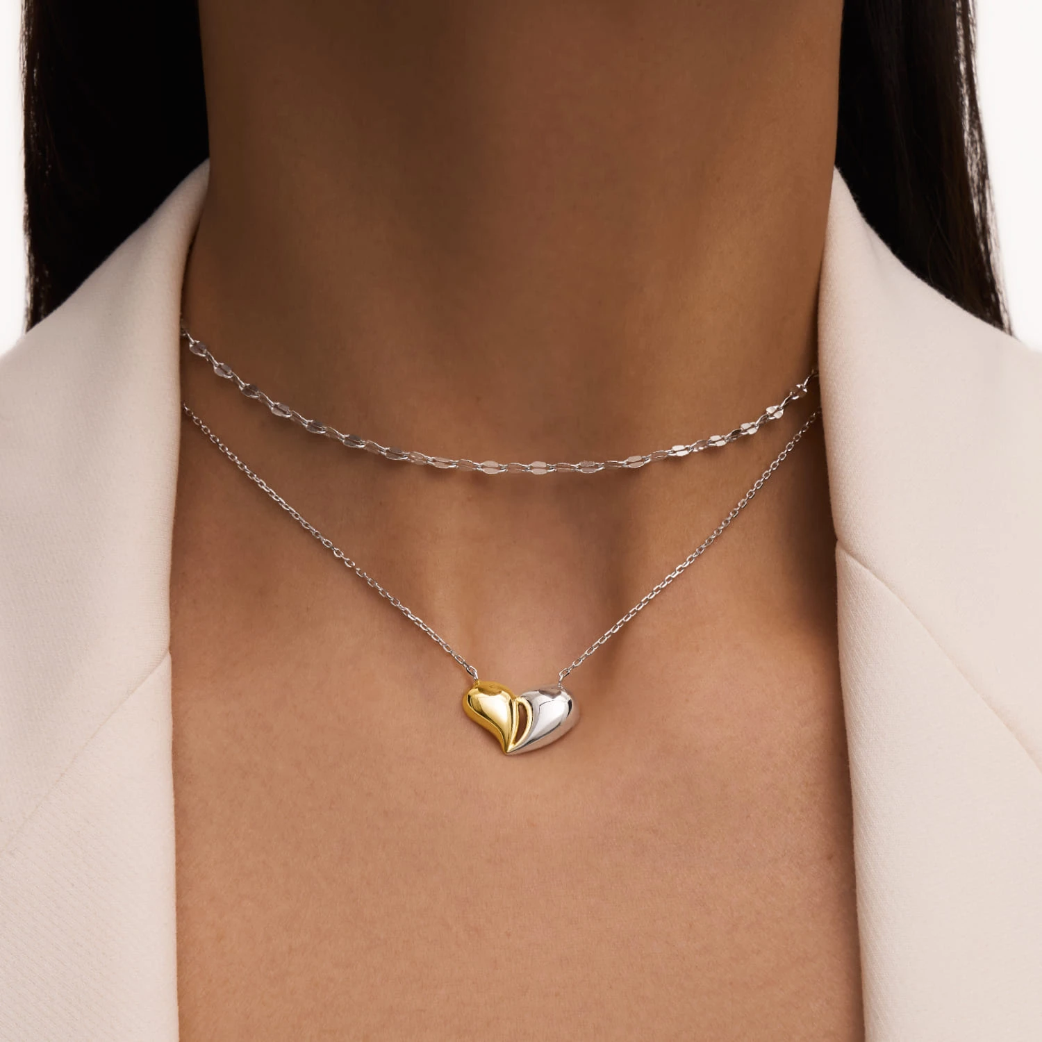 Серебряное колье с подвеской в форме сердца биколор
