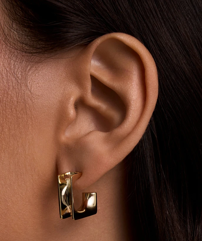 Серебряные серьги вогнутой формы в покрытии желтое золото