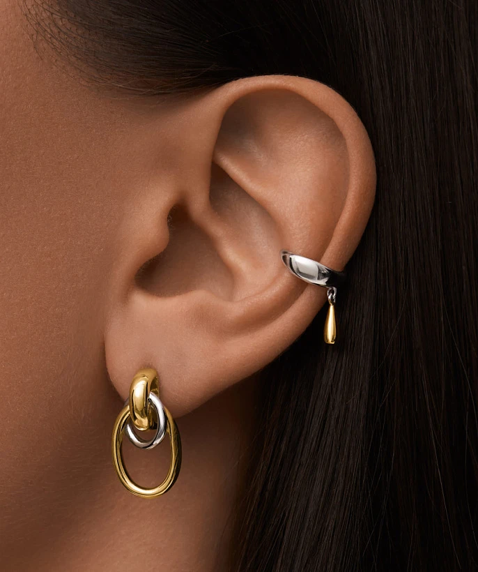 Серебряные крупные серьги-узлы в покрытии биколор