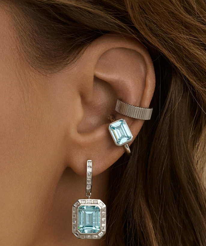 Серебряный кафф без вставок с фактурной поверхностью 