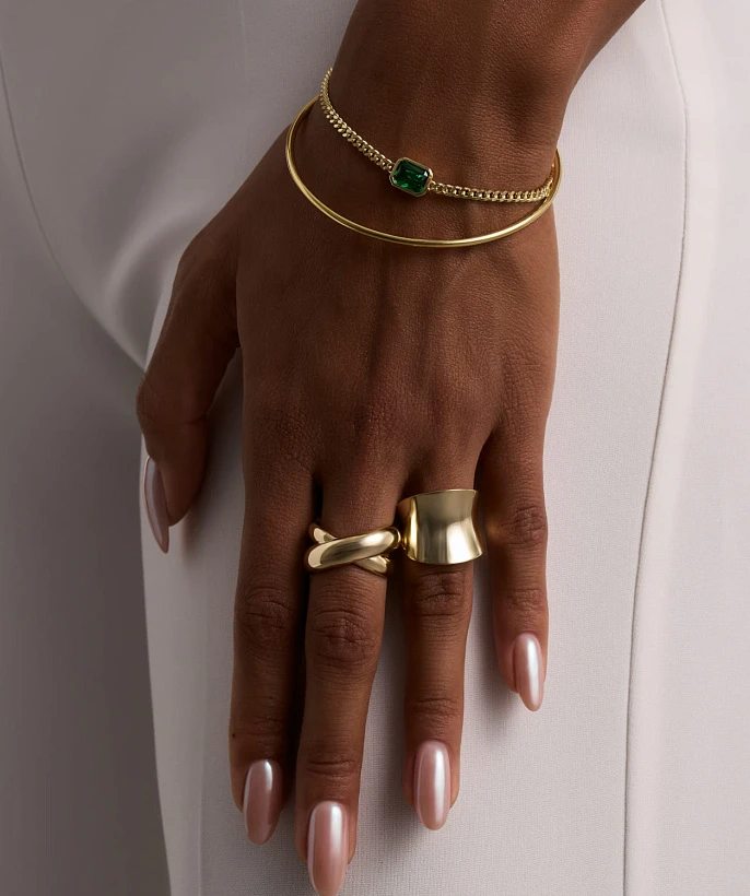 Серебряный жесткий браслет в покрытии желтое золото