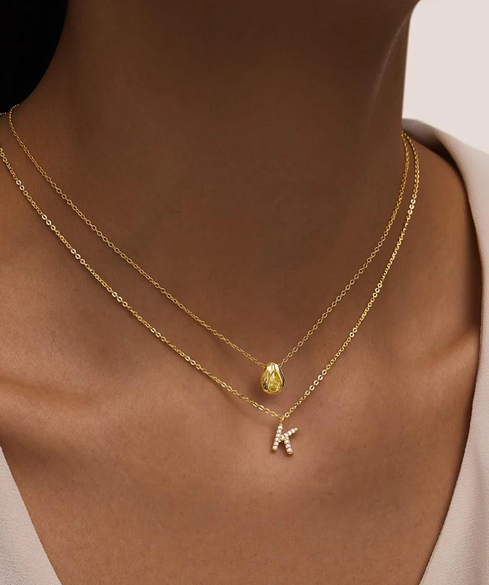 Серебряное колье  в покрытии желтое золото  с буквой К MIESTILO